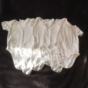 6 short sleeve white onesies size 3-6 months.